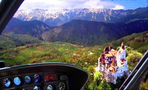 Rent a helicopter in Romania and fly over Dracula's Castle